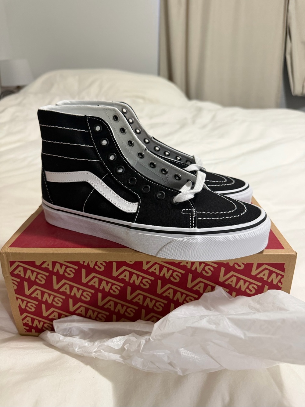 Vans Black and White High-Top Skate Sneakers